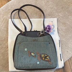 Chala convertible backpack featuring a Sea Turtle Design.
